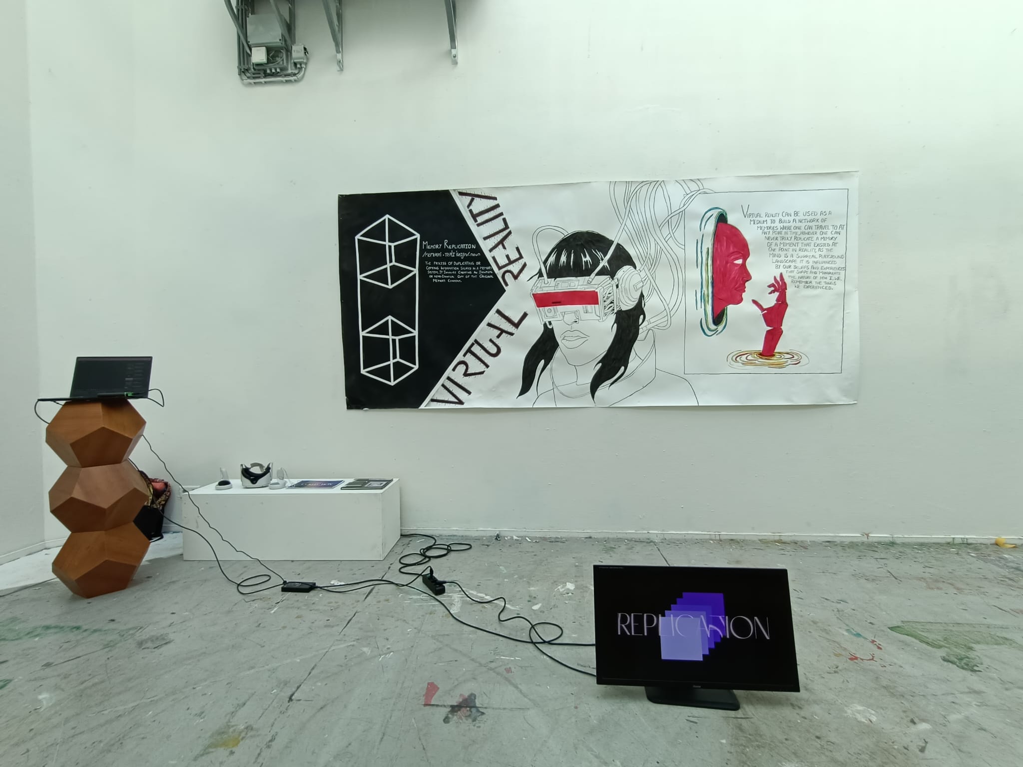 Memory Replication installation with painted banner, headset station and title screen